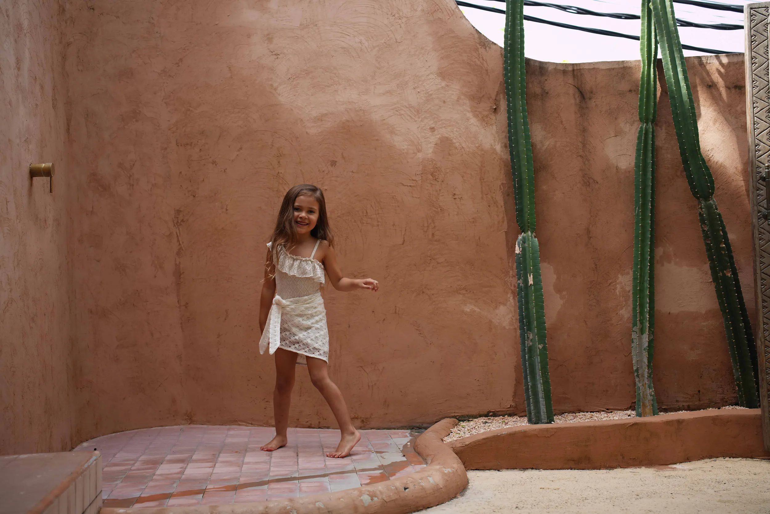 Rosa in a wide open landscape — byduran authentic family travel photography